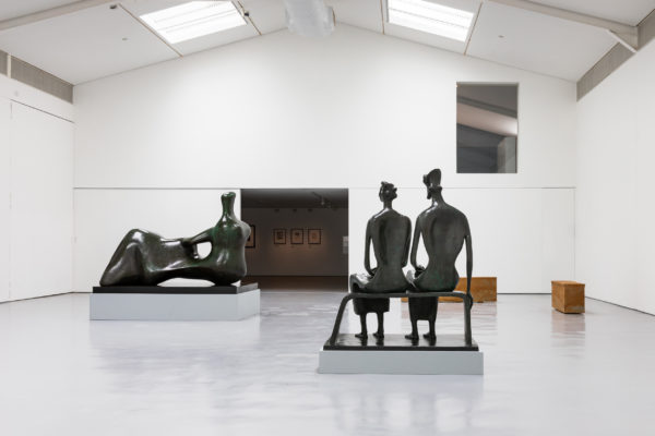 Installation view with Henry Moore, King and Queen 1952-53 bronze (LH 350), Reclining Figure: Hand 1979 bronze (LH 709) and Edmund de Waal, tacet X and XI, Hornton stone, 2020.