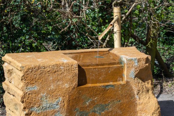 a stone for two hands and water